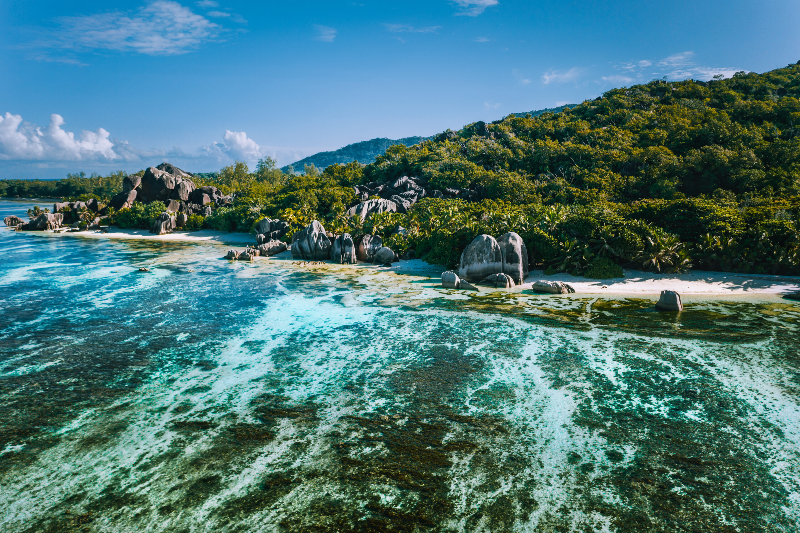 Aerial view of Seychelles tropical beach Anse Source D Argent at La Digue island.